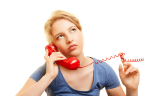 frustrated woman on hold