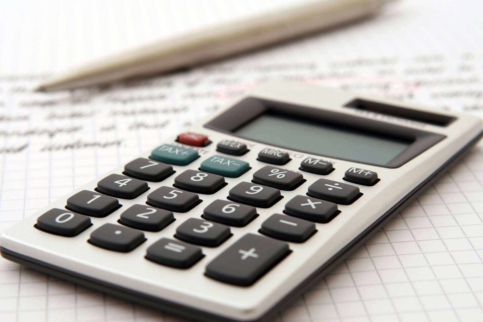 Photo of a calculator and tax documents