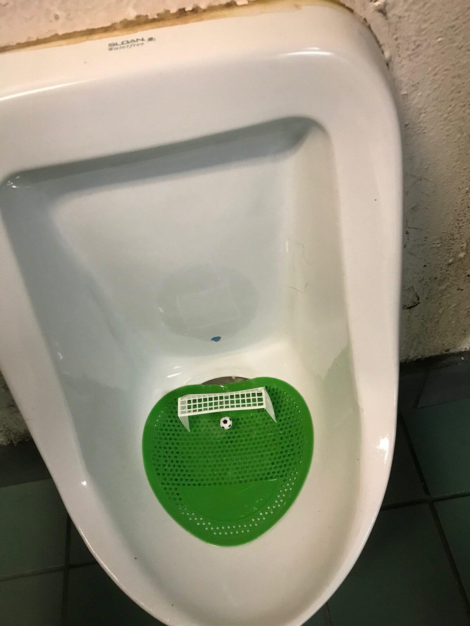 A urinal with a soccer goal and a ball hanging from a string so it moves when you... you get the idea. Now that's a memorable bathroom experience!