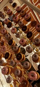 A wall of donuts is a more immersive event experience than just serving them on a plate.