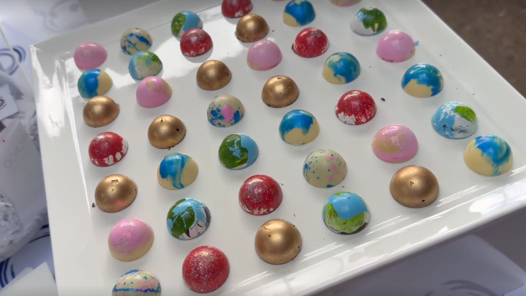 A display of mystery bonbons. The coloring of each does not necessarily reflect the taste, hence the mystery.